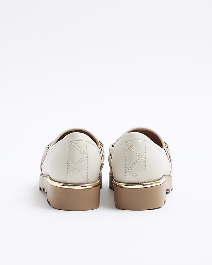 Cream quilted chain loafers