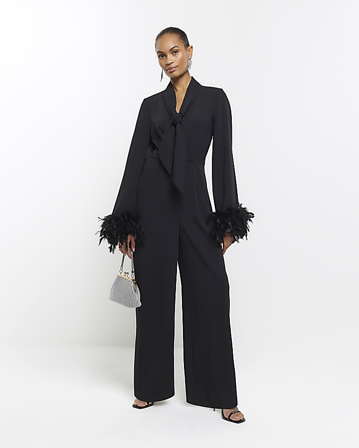 Black jumpsuit with store feathers