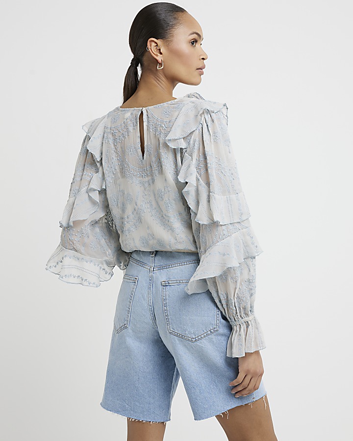 Blue frill fluted cuff blouse
