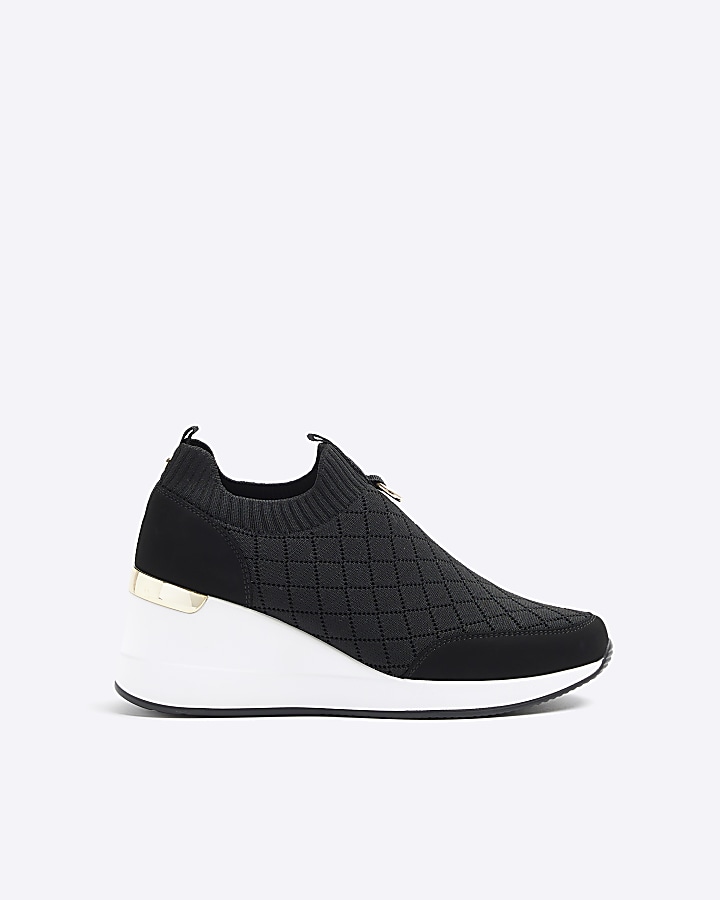 Black wide fit quilted wedge trainers