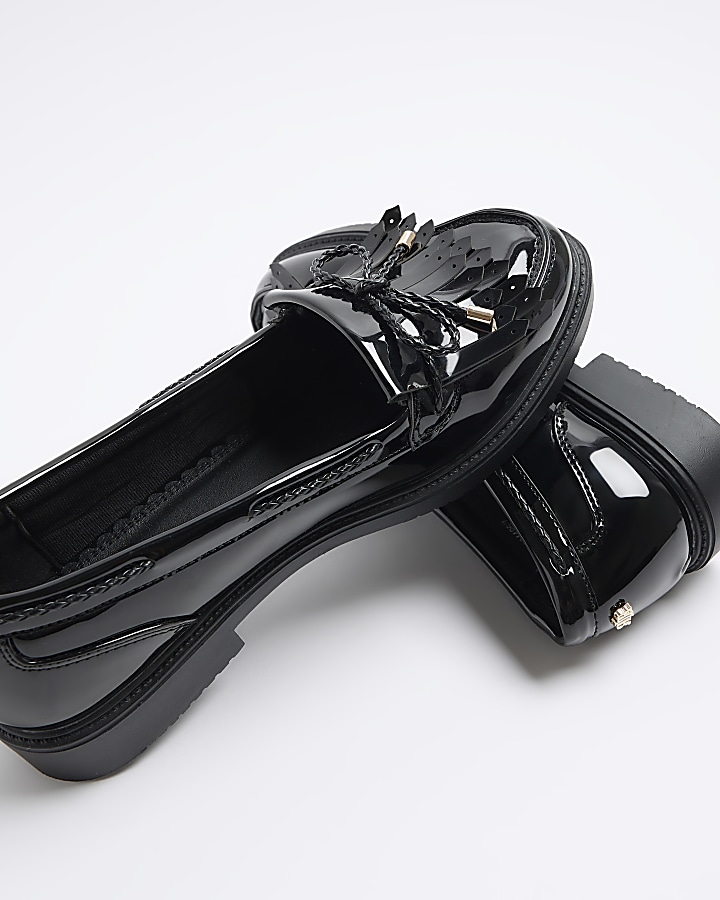 Black bow fringe loafers