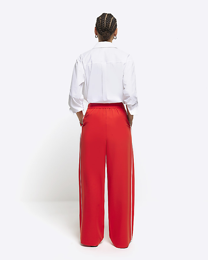Red side stripe wide leg trousers