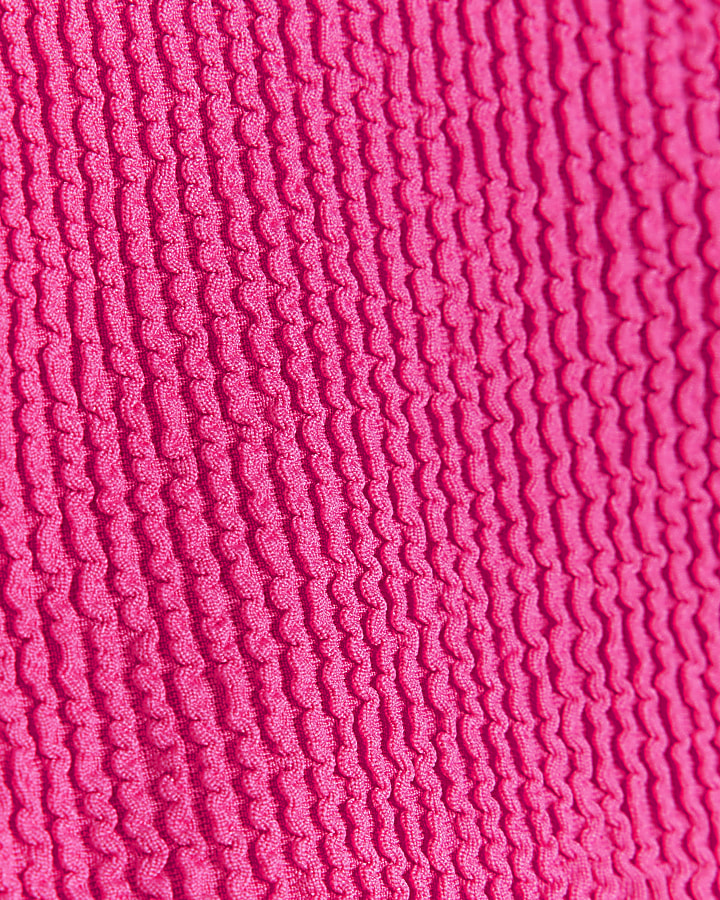 Pink low rise knot bikini bottoms