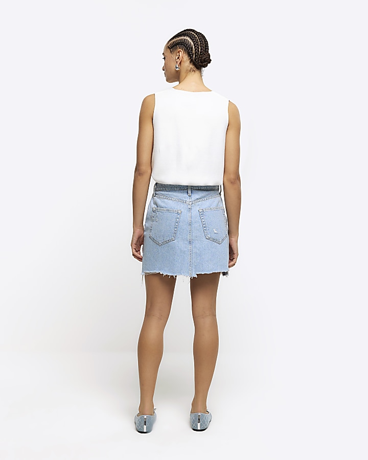 Blue asymmetric distressed denim mini skirt