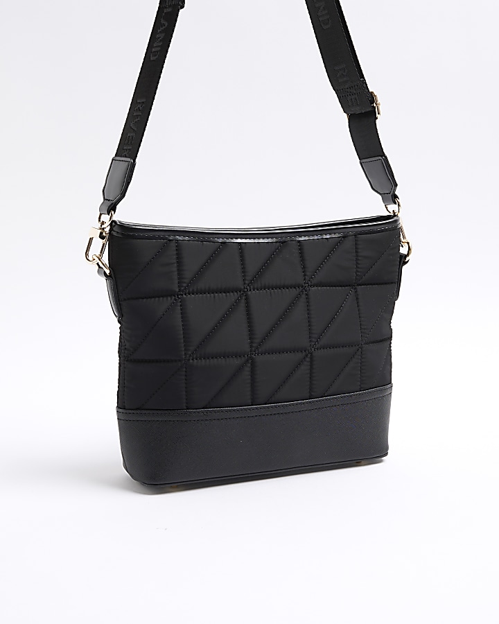 Black webbing quilted cross body bag River Island