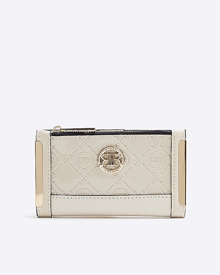 Cream embossed mini purse