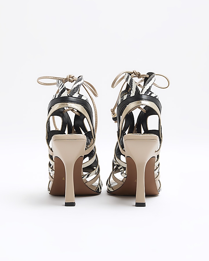 Beige animal print caged heeled sandals