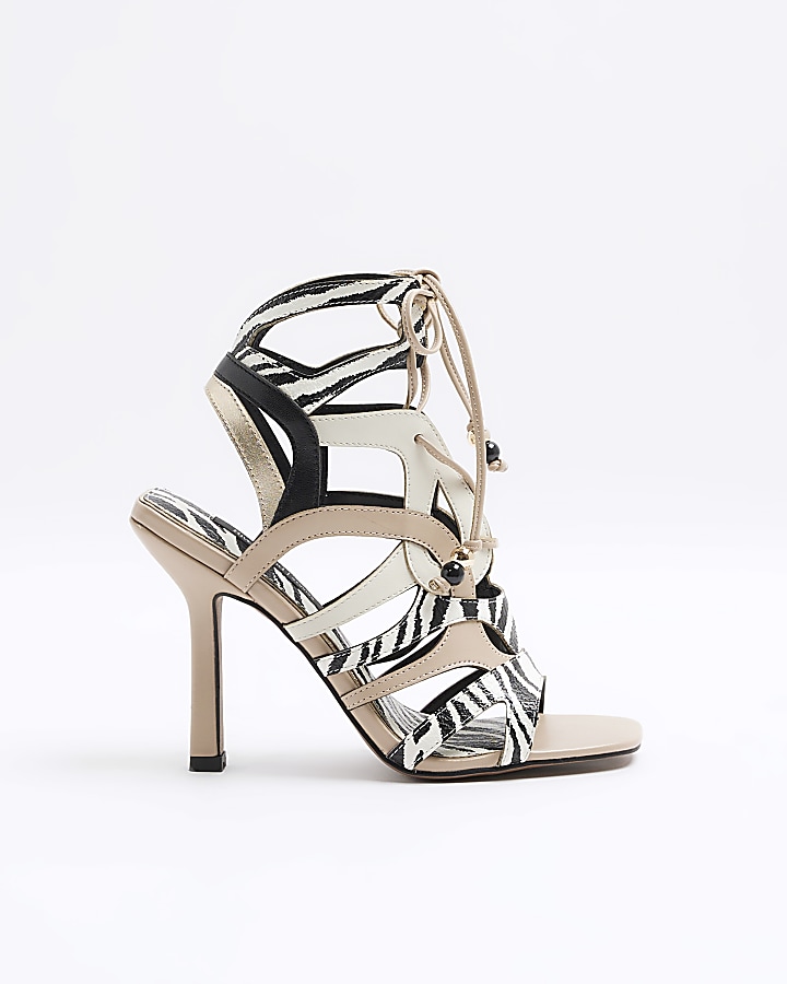 Ecru animal print caged heeled sandals