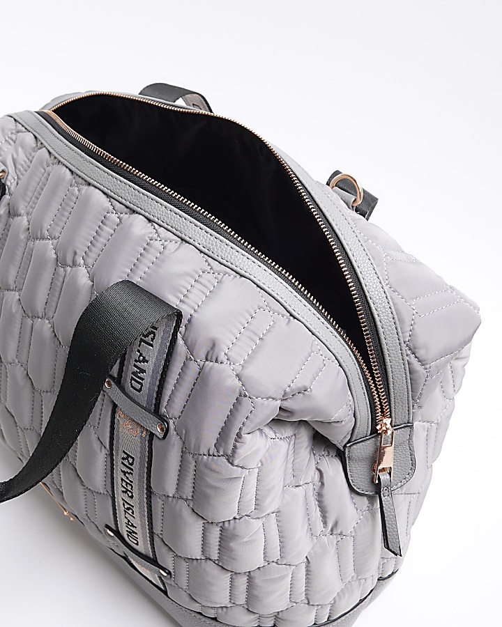 Grey quilted webbing travel bag