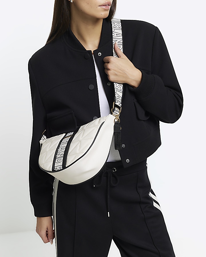 Cream webbing quilted cross body bag River Island
