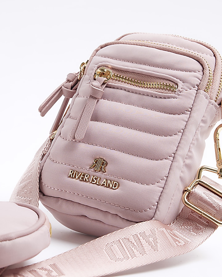 Pink quilted phone cross body bag River Island