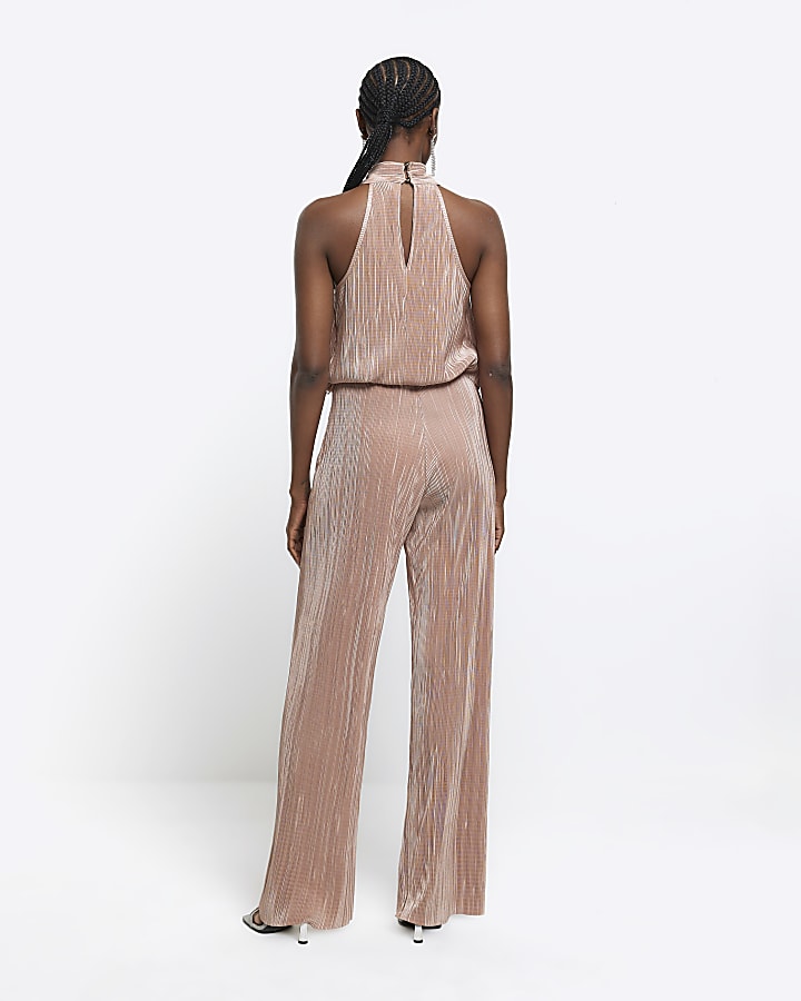 Rose gold plisse flare trousers | River Island