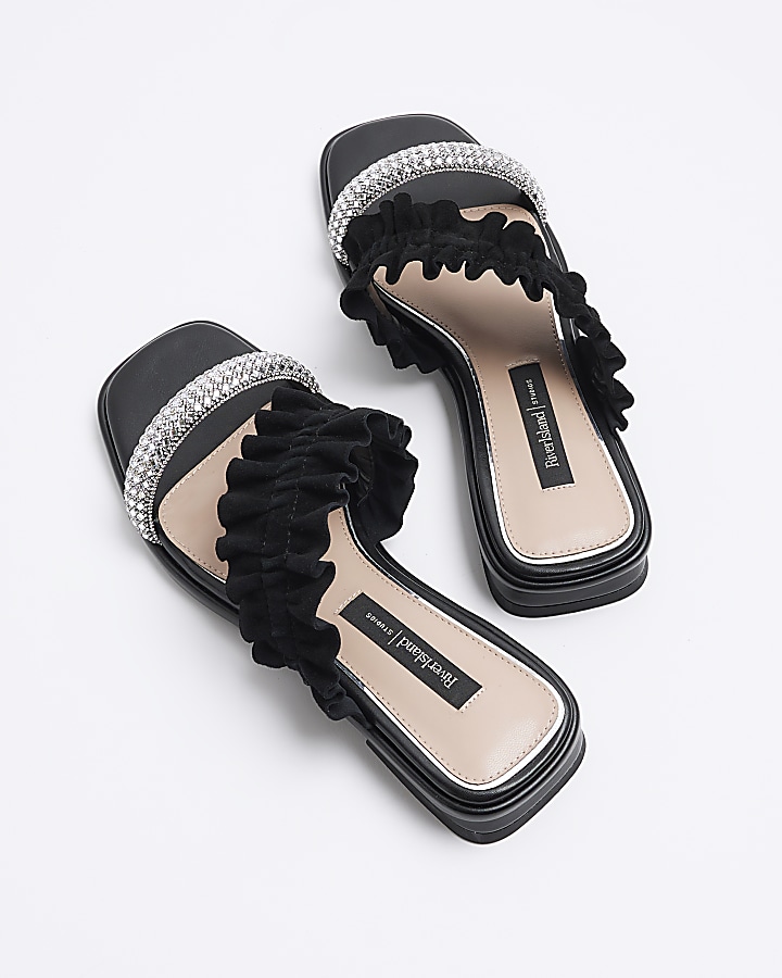 Black suede ruffle strap sandals