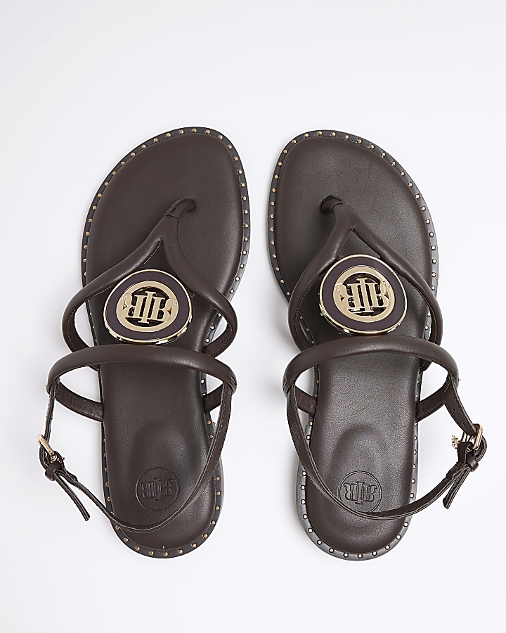 Brown studded flat sandals