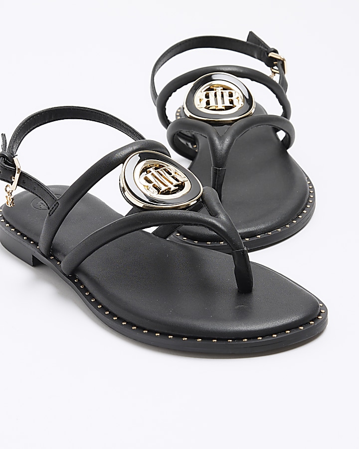 Black studded flat sandals