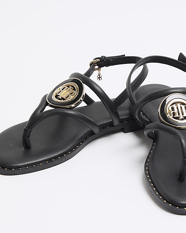 Black studded flat sandals