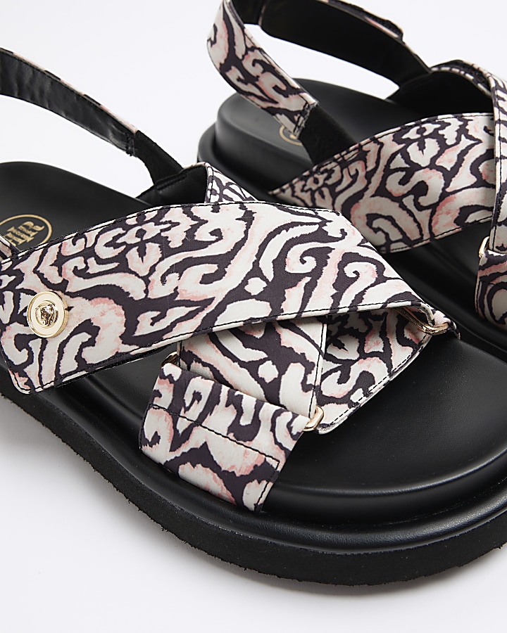 Black abstract crossed sandals