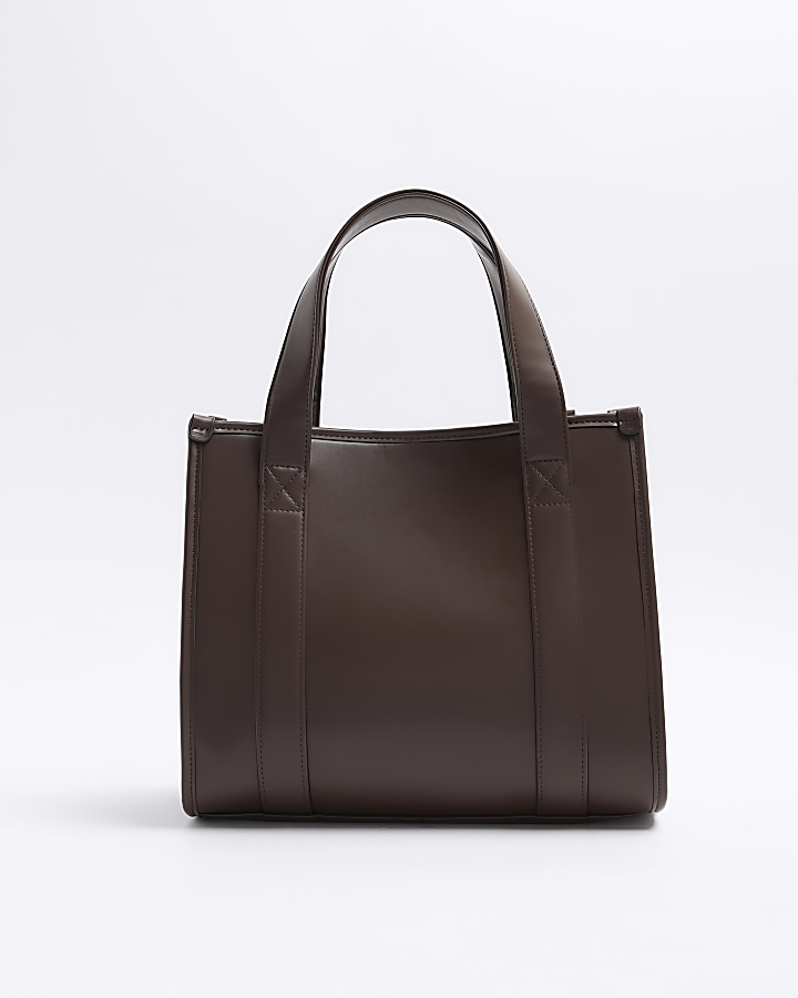 Brown embossed cross body tote bag River Island