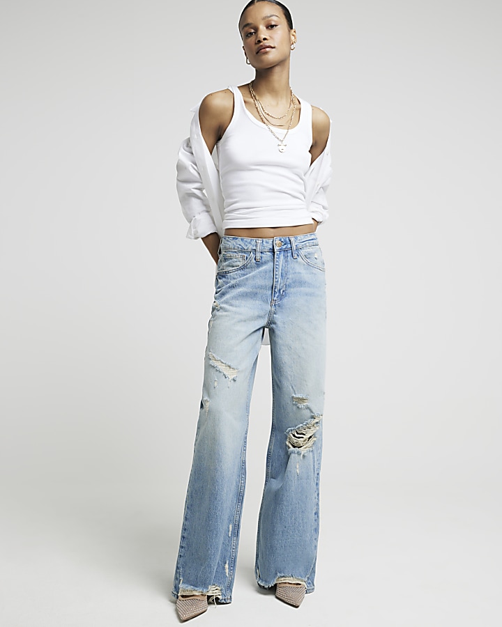 Blue mid rise ripped wide leg jeans