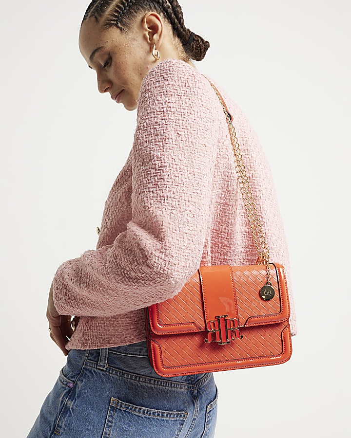 Red embossed woven satchel bag