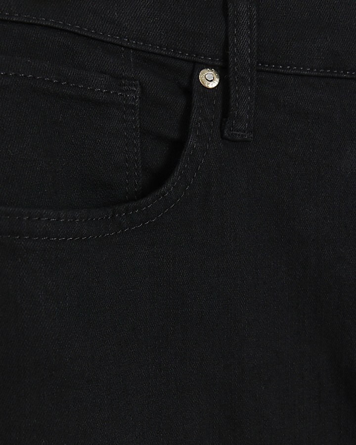 Petite black high waisted flare jeans | River Island