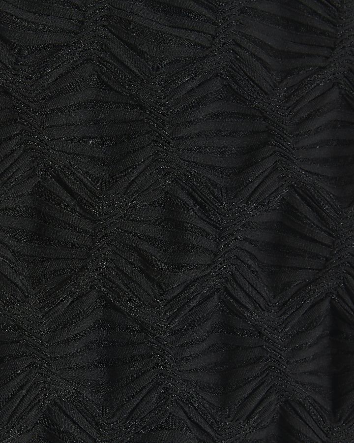Black textured long sleeve top