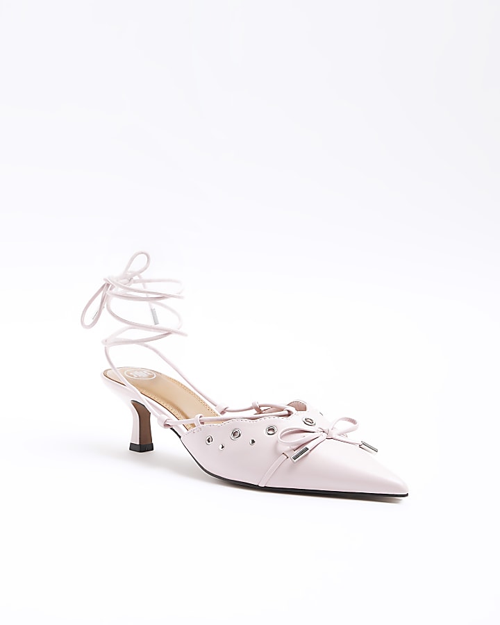 Pink eyelets lace up heeled court shoes