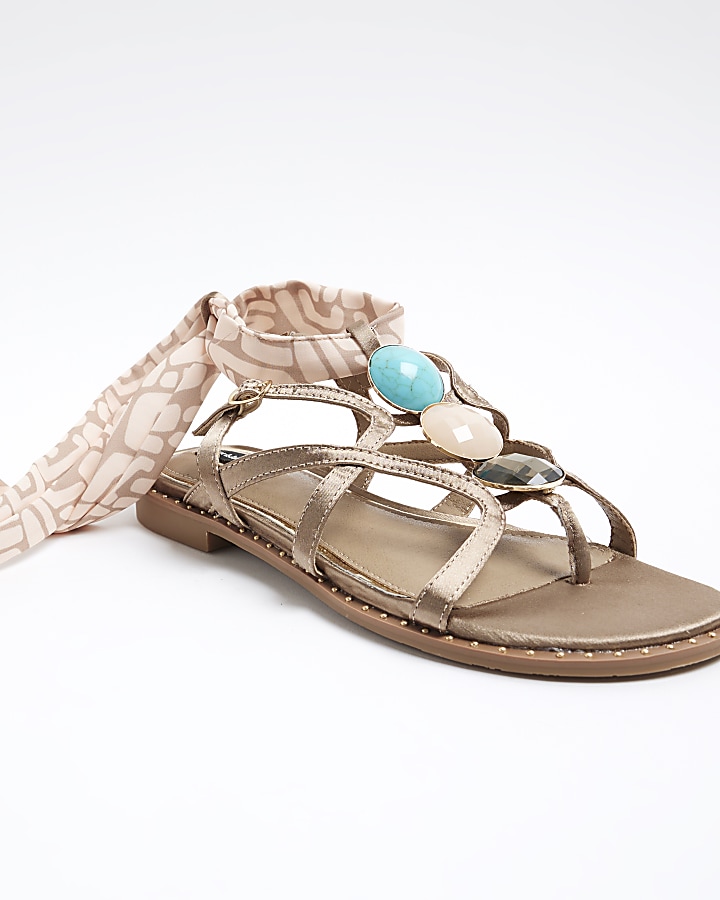 Beige embellished tie up sandals