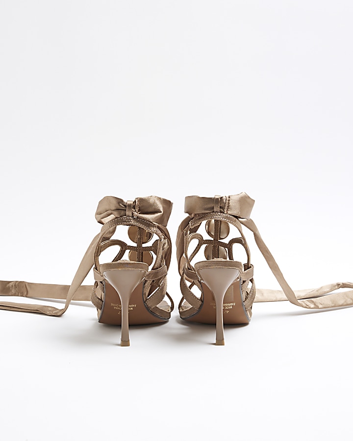 Beige embellished tie up heeled sandals
