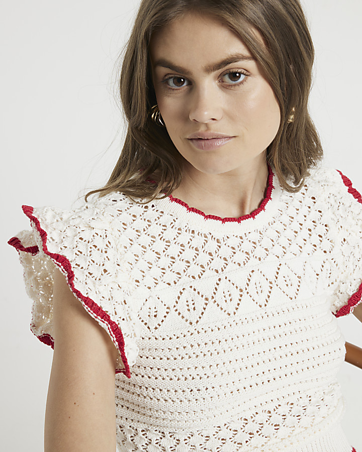 Cream frill sleeve knit top