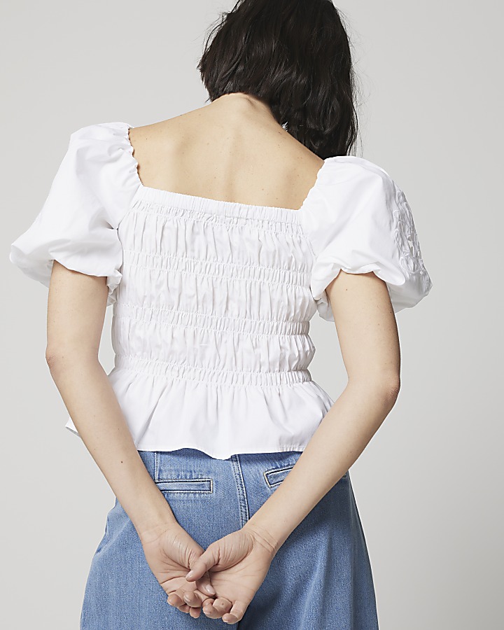 White shirred cut out puff sleeve blouse