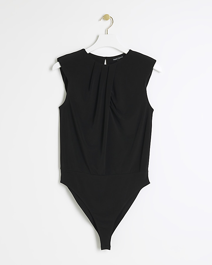 Petite black shoulder pad bodysuit