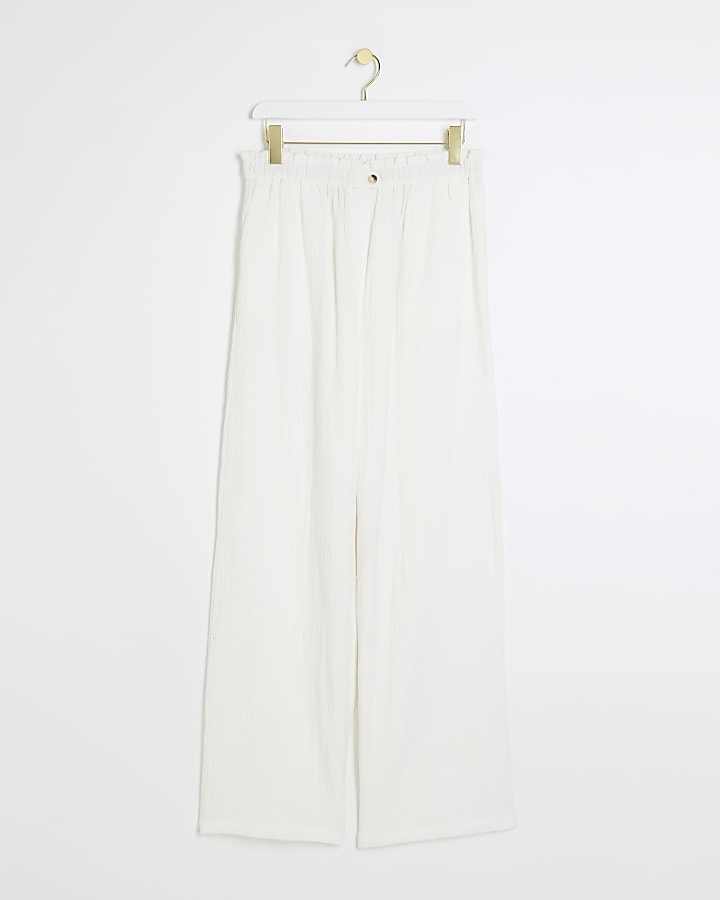 White textured wide leg trousers