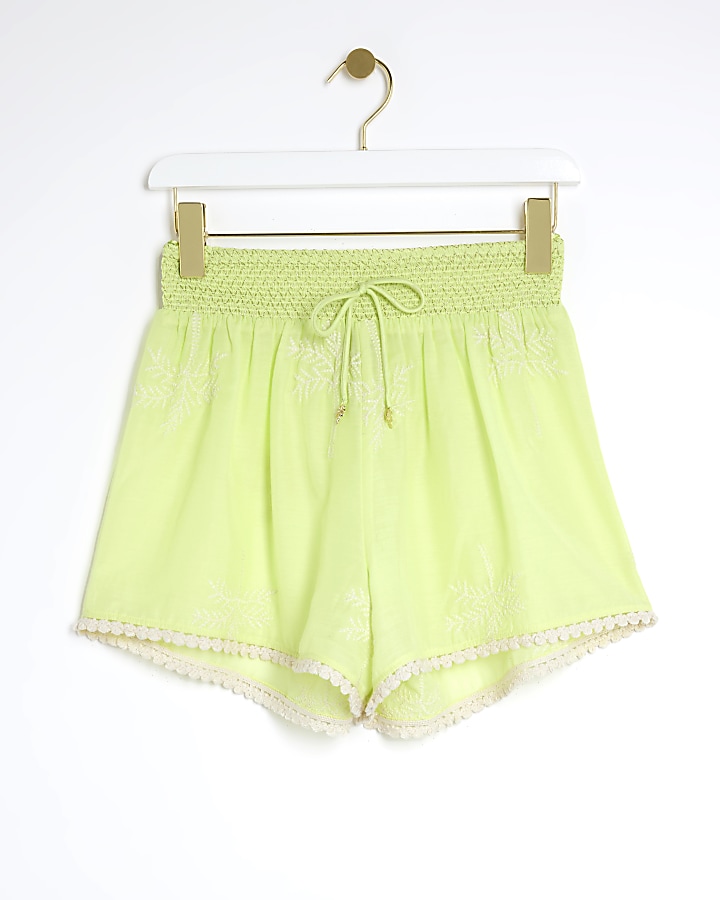 Yellow embroidered beach shorts