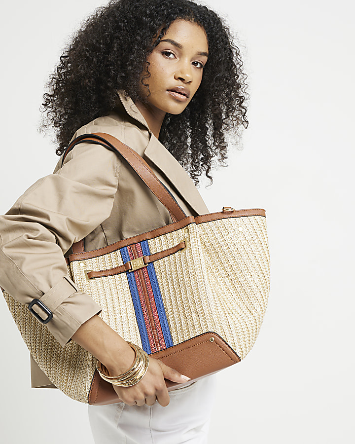 Beige straw winged tote bag