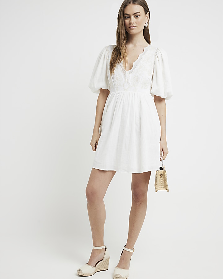 Cream embroidered smock mini dress