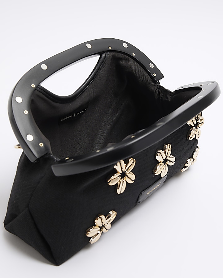 Black floral shell embellished clutch bag
