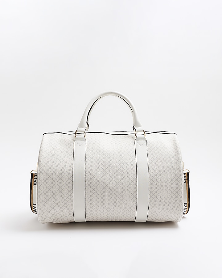 White monogram buckle strap travel bag
