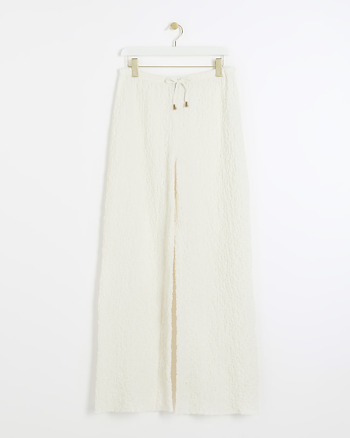Cream textured wide leg trousers