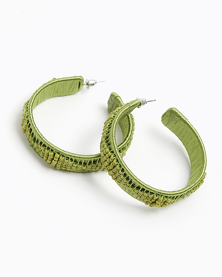 Green beaded hoop earrings