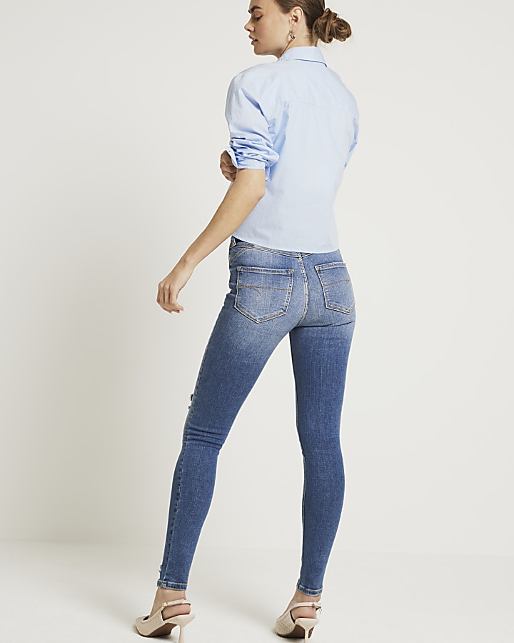 Blue mid rise molly super skinny jeans