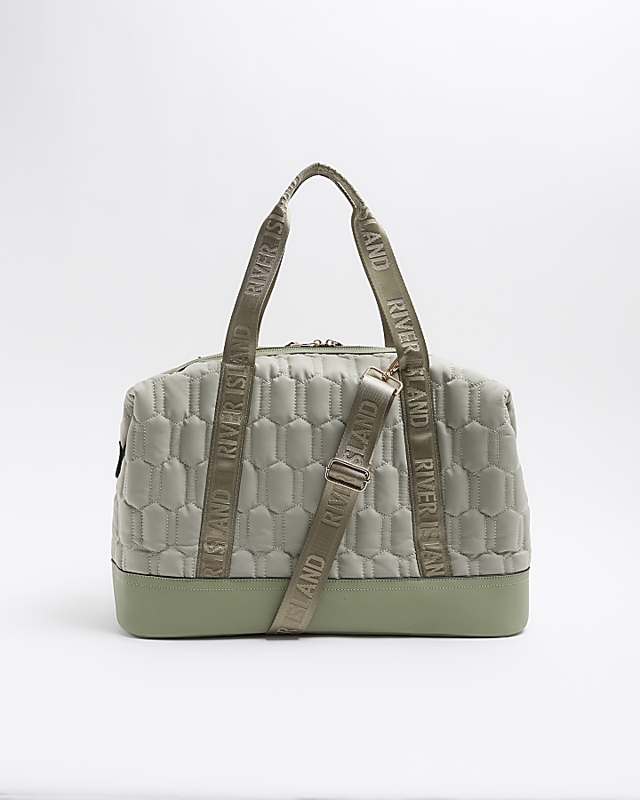 Green quilted webbing travel bag
