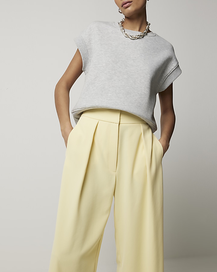 Yellow pleated hot sale trousers