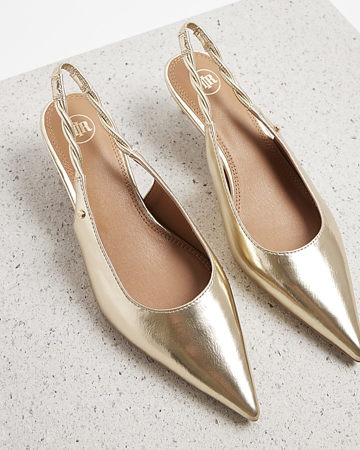 Gold sling back heeled court shoes