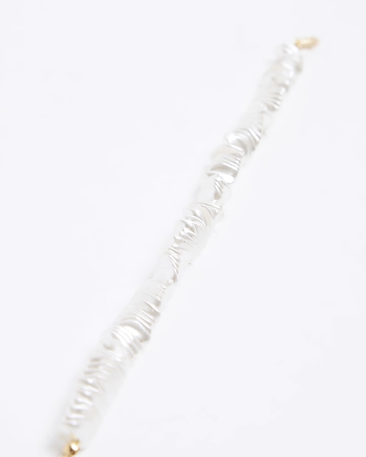 White chipping anklet