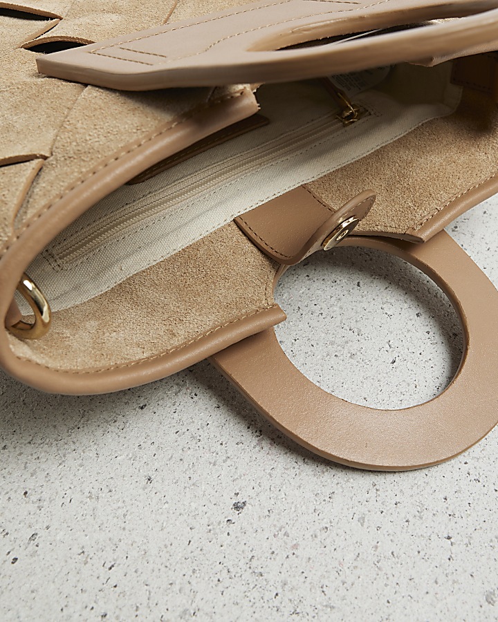 Brown circle handle leather tote bag