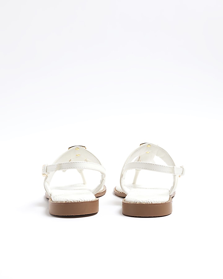 White tassel flat sandals