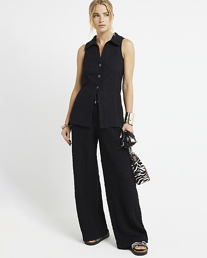 Black wide leg textured trousers