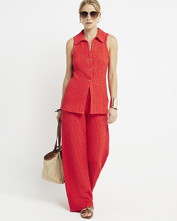 Red textured wide leg trousers