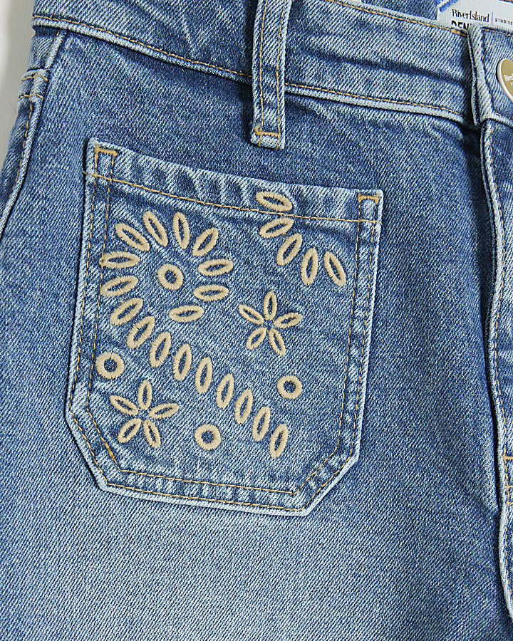 Blue high waisted embroidered flared jeans